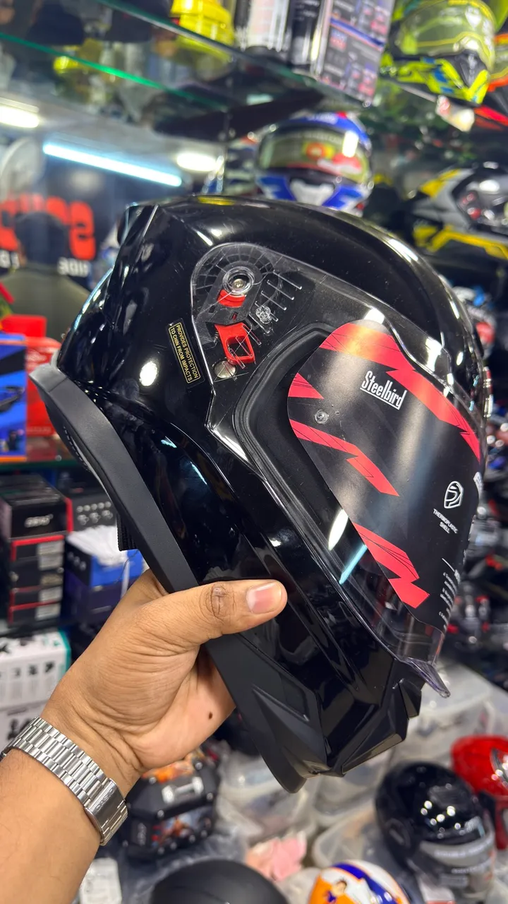 Steelbird flip-up modular helmet with the chin bar lifted, Speed World