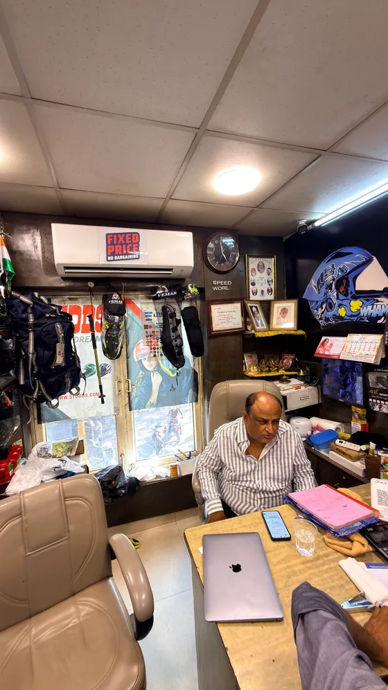 The owner at the Speed World counter